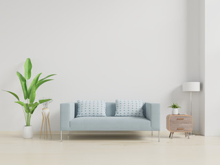 Modern living room interior with sofa and green plants,lamp,table on white wall background.