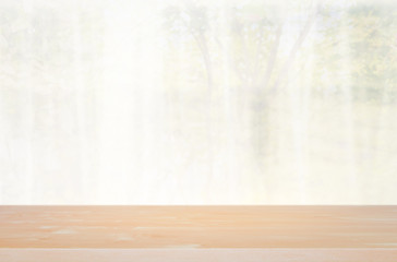 defocused curtain window and stationery box with sunlight.