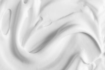 White thick foam texture background. Cream, mousse, cleanser, shaving foam, shampoo. Foamy skin...