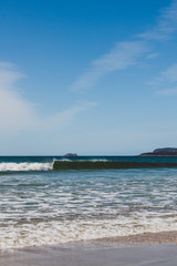 sunny pristine and deserted beach overlooking the South Pacific Ocean