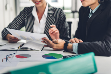 Successful of two casual business working discussing strategy with new startup project.creative business people planning and brainstorm with document report in modern office.Teamwork concept