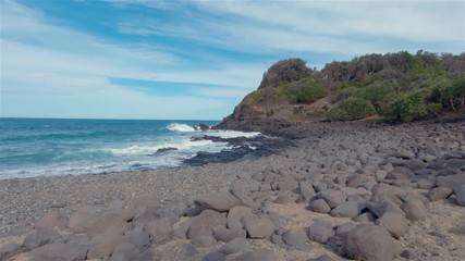 Boulder Beach & Headland Cliffs. Lennox Head Landscape Australia New South Wales. Ocean & Rocky Sea Boulders. Sunny Blue Cloudy Sky Over Coastal Shore At Popular Seaside Family Holiday Destination