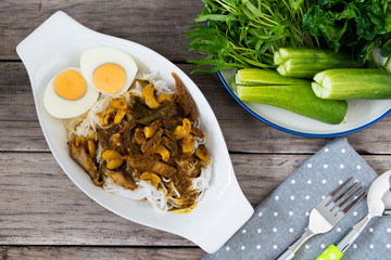 Thai Rice Vermicelli with Kaeng Pung (Tai) Pla Nam Khon (Fish Kidney Thick Spicy Soup).