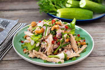 Steamed rip chicken spicy salad with shallot, celery, chili and Scallion.
