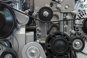 Fototapeta na wymiar Diesel engine parts engine belt gear close-up