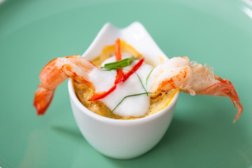 Steamed Seafood Curry Cakes with coconut cream and Prawn.