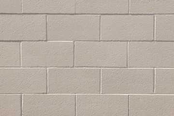 Soft pastel cream colored brick wall