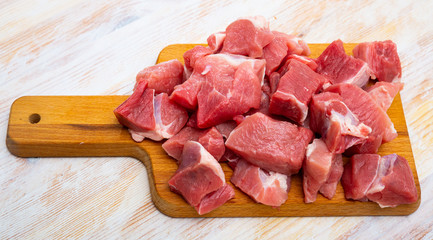 Uncooked chopped pork for stew