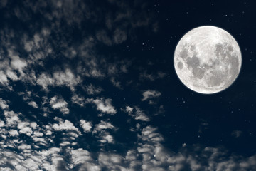 Full moon with cloud on the sky at night.