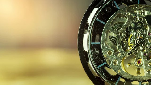 Time lapse closeup pocket watch on table and sunlight. At 8 am. o'clock in the morning. Concept of starting work today.