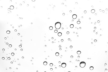 Rain drops on window glasses surface Natural Pattern of raindrops. Natural pattern of raindrops on white background for your design.