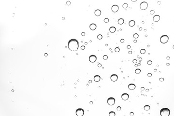 Rain drops on window glasses surface Natural Pattern of raindrops. Natural pattern of raindrops on white background for your design.