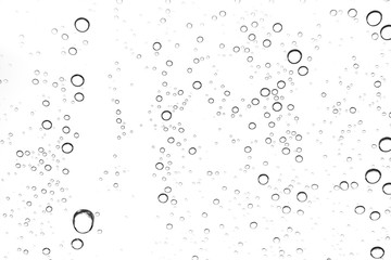 Rain drops on window glasses surface Natural Pattern of raindrops. Natural pattern of raindrops on white background for your design.