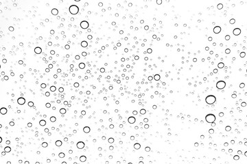 Fototapeta na wymiar Rain drops on window glasses surface Natural Pattern of raindrops. Natural pattern of raindrops on white background for your design.
