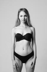 Fototapeta premium portrait of exquisite woman in lingerie sitting.