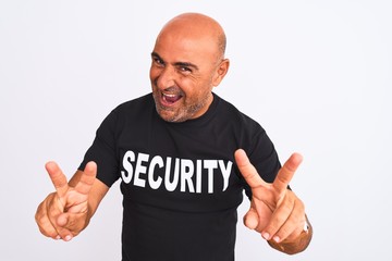 Middle age safeguard man wearing security uniform standing over isolated white background smiling...