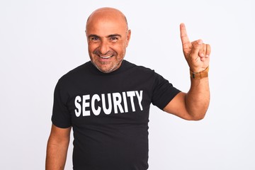 Middle age safeguard man wearing security uniform standing over isolated white background showing...