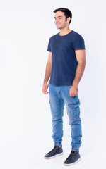 Obraz premium Full body shot of young handsome Persian man