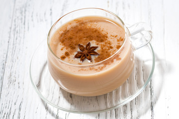cup of masala tea on white background, closeup