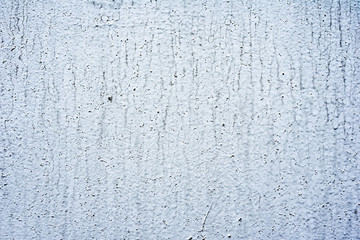 Texture of a concrete wall with cracks and scratches which can be used as a background