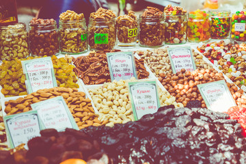 Russian market selling different types of nuts, seeds and dried fruits.