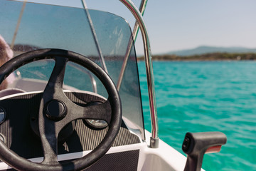 Obraz premium yacht control wheel and implement. Boat steering gear close up