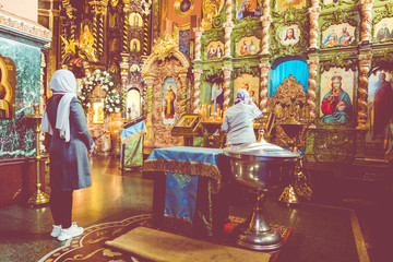 Fototapeta premium People praying in Kazan cathedral.