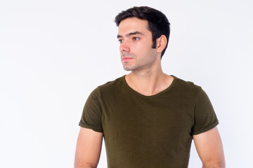 Fototapeta premium Face of young handsome Persian man thinking