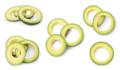 Set of fresh ripe avocado slices on white background