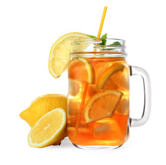Mason jar of refreshing iced tea with lemon slices and mint on white background