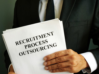 Businessman holds Recruitment Process Outsourcing RPO.