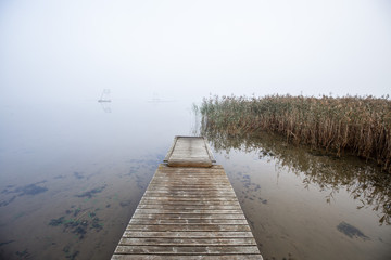 Fototapeta premium Scenic landscape with morning mood and fog at autumn in Finland