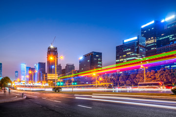Fototapeta na wymiar Night Scene and Fuzzy Car Lights of Urban Roads in Jinan, China