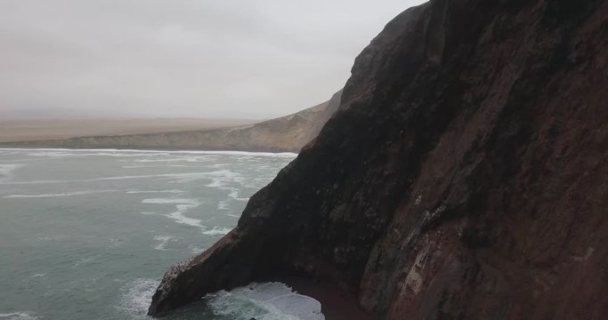 A smooth drone shot showing beautiful natural cliffs near Paracs in Peru.