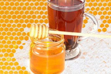 Tea and honey. The honey in the comb.