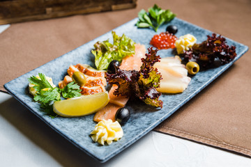 Assorted fish and seafood. Appetizer for white wine.