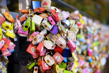 Fototapeta na wymiar Master key locks at N Seoul Tower,Many couple and tourists come to tower put the name on key and locked by lover at the bridge on the top of tower.It means love forever,a symbol of Seoul,South Korea