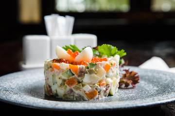 Fresh salad on ceramic plate
