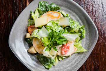Caesar salad with fresh lettuce, parmesan and fried croutons.
