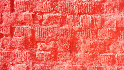 abstract uneven surface of pink brick wall