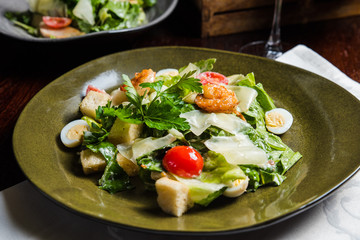 Caesar salad with fresh lettuce, parmesan and fried croutons.