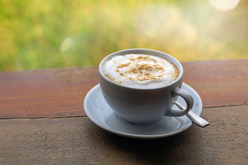 Hot mocha coffee in the morning in a white glass