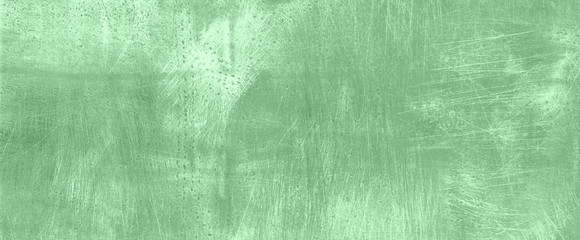 Fototapeta premium Mint cement concrete background. Grunge texture, wallpaper. Copy space. Banner. Concrete texture, stone ground. Trendy mint color