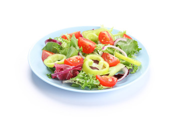 Salad of fresh vegetables isolated on white background