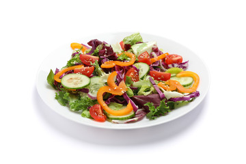 Plate with fresh salad isolated on white background