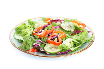 Plate with fresh salad isolated on white background