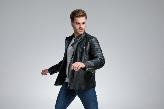 casual man standing on guard alert