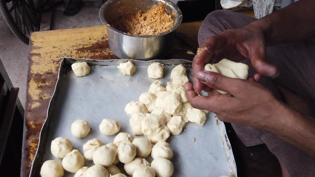 Kachori is a spicy snack, originating from Indian subcontinent. A round flattened ball made of fine flour filled with a stuffing of baked mixture of yellow moong dal or Urad Dal, besan and spices. 