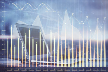 Financial market graph hologram and personal computer on background. Multi exposure. Concept of forex.