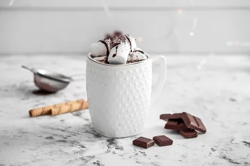 Tuinposter Cup of hot chocolate with marshmallows on white table © Pixel-Shot